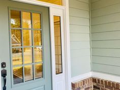 the front door of a house with glass panes