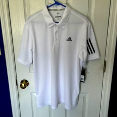 Perfect For The Course Or A Summer Get Together! Pit To Pit : 19 Inches Length: 32 Inches Golf Polo Shirt With Three Stripes, White Adidas T-shirt With Moisture-wicking, White Collared Sporty T-shirt, White Polo Shirt For Sports, Casual Three-stripes Golf Tops, White Sporty Moisture-wicking Shirt, Sporty White Moisture-wicking Shirt, White Sporty Shirt With Moisture-wicking, Casual Three Stripes Tops For Golf