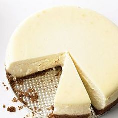 a cheesecake with one slice missing from it