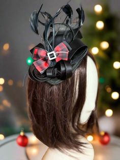 Christmas Bow Satin Fascinator Introducing the Plaid Bow Satin Christmas Fascinator by The Head Mistress ! Satin bow-style Fascinator with a buffalo check plaid bow. Fascinator fixes to hair with an included clip. Elevate your holiday look with this exquisite fascinator designed to make you stand out during the festive season. Main Features: Festive Elegance: Add a touch of Christmas spirit to your outfit with this eye-catching fascinator. Premium Quality: Crafted with high-quality materials for durability and a stylish appearance. Unique Design: Stand out at any Christmas event or gathering with this charming accessory. Affordable Luxury: Available at the lowest prices without compromising on quality. USA-Made: Designed, printed, and shipped from the USA for a seamless shopping experience Winter Party Hats With Bow, Black Bow Fascinator For Formal Occasions, Black Fascinator For Kentucky Derby Gift, Party Mini Hat Headband With Bow, Christmas Fascinator, Bow Fascinator, Fabric Photography, Bow Style, Christmas Event