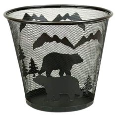 a metal trash can with a bear and mountain scene on the front, in black