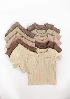 Perfect for all day wear, our organic cotton short sets are extremely versatile and can seamlessly transition from daytime play to nighttime sleep. We absolutely love how effortless it is to dress your little one in these matching sets.  * Skin-friendly and hypoallergenic  * Snug fit in compliance with regulations  * Buttery soft 4x2 ribbed fabric, 210 gsm  * 95% Organic Cotton & 5% Spandex  * OEKO-TEX® certified fabrics and dyes Additional Information * Colours might differ from their appearanc Cotton Bedtime Sets In Solid Color, Beige Short Sleeve Tops For Playtime, Solid Ribbed Summer Sets, Solid Cotton Tops For Bedtime, Beige Cotton Tops For Playwear, Cotton Ribbed Sleepwear, Beige Cotton Tops For Playtime, Ribbed Solid Cotton Sleepwear, Gender Neutral Outfits Baby