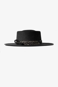 The SRV RELIC HAT is a must-have bolero for any fan of the legendary Stevie Ray Vaughn. Handcrafted from 100% Merino wool, this hat features a cotton headband, 10cm stiff brim, and adjustable fit for maximum comfort. 

The bespoke customization and original hand and flame relicing wax techniques create a unique, vintage-inspired look that is sure to turn heads. The hat is finished with a vintage bandana and our signature guitar pic, adding a touch of rock and roll edge to any outfit. Whether you Guitar Pic, Stevie Ray Vaughn, Signature Guitar, Vintage Bandana, Guitar Pics, Cotton Headband, Stevie Ray, Style Icons, Rock And Roll