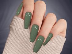 Elevate your nails with our sophisticated Hunter Sage Green Press on Nails! Crafted with meticulous attention to detail, these custom hand-painted nails feature a rich and elegant sage green hue, perfect for adding a touch of luxury to any look. You will receive a full set of 10 nails in your size along with a complimentary gift of a nail file, cuticle stick, alcohol wipes, and nail glue. If you prefer tape tabs instead of glue, just let us know. I am more than happy to personalize your order, s Matte Olive Nails, Sage Green Stiletto Nails, Green Nails Coffin Shape, Lemon And Lime Nails, Muted Green Nails, Sage Color Nails, Green Coffin Acrylic Nails, Sage Green Acrylic Nails, Fall Green Nails