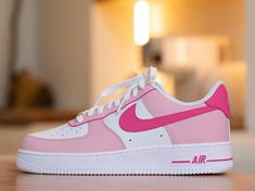 Step up your sneaker game with our Custom Pink Nike Air Force 1 Sneaker! These bold kicks will make a statement as you take on any challenge. The unique design adds a touch of risk-taking to your style. Step out in confidence and show off your adventurous side with these sneakers. 🔥 100% genuine, Brand New.👟 Custom sneakers.★Every pair is hand-made and unique.✨Best quality waterproof and scratch-proof paints used.🎉 1000+ satisfied customers across various platforms.🎁 Treat the shoes as art a Sporty Lace-up Sneakers With Waterproof Paint, Pink High-top Custom Sneakers With Waterproof Paint, Casual Pink Custom Sneakers With Waterproof Paint, Casual Custom Pink Sneakers With Waterproof Paint, Waterproof Lace-up Sneakers For Sports, Waterproof High-top Leather Sneakers, High-top Leather Sneakers, Custom Waterproof Lace-up Sneakers For Sports, Waterproof Leather Lace-up Sneakers