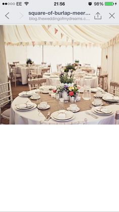 the tables are set with white plates and place settings for an elegant wedding breakfasteon