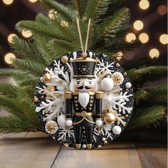 a nutcracker ornament hanging from a christmas tree