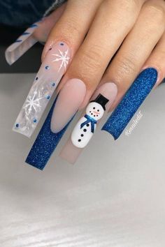 Trendy Winter Nails Long, Simple Christmas Nails Acrylic Long, Christmas Nails Acrylic Snowman, Snowman Christmas Nails Acrylic, Long Christmas Nails 2022, Simple Snowflake Nails Acrylic, Winter Acrylics Nails, Royal Blue Christmas Nails Acrylic, Christmas Theme Acrylic Nails