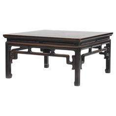 A Chinese Qing Dynasty period walnut wood coffee table from the 19th century Square top with waisted apron atop a black lacquered frame and horse hoof legs. The table has a natural age-related patina enhanced with a clear lacquer finish. China 1840-1860. Asian Coffee Table, Chinese Table, Horse Hoof, Asian Interior, China Furniture, Square Top, Decoration Originale, Wood Coffee Table, Room Makeover Bedroom