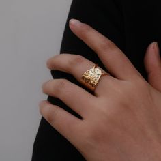 The stylish Gold Hammered Ring is a simple but classic go-to piece. The openwork and hammered texture make the ring unique and dainty. 18k gold plated Stainless steel base Waterproof and tarnish free Adjustable from US size 6-10 Ring sizing chart Elegant Hammered Midi Rings For Gift, Elegant Hammered Wide Band Open Ring, Hammered Gold Plated Ring, Hammered Gold Plated Open Ring, Hammered Open Wide Band Promise Ring, Hammered Open Midi Rings For Anniversary, Elegant Gold Rings With Hammered Detail, Elegant Hammered Wide Ring For Promise, Anniversary Open Midi Rings With Hammered Detail