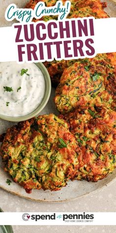 zucchini fritters on a plate with ranch dressing