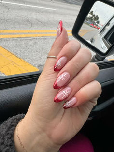 Red French Tips With Snowflakes Almond, Red Tip Oval Nails, Red Chrome Xmas Nails, Red Nails White Snowflake, Winter Nails Almond Shape Red, Red French With Snowflake, Aura Nails Christmas, Red Chrome Nails With Snowflake, French Manicure With Snowflake Design