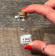 Lovely little personalised handmade 6th Anniversary miniature iron anniversary gift. A tiny keepsake gift with your 6 year anniversary date or wedding date  Please note that unless specifically asked for a different year it will say '6 Years' and the date under it Iron in a mini glass bottle with cork lid. Mini glass bottle size: 22mm x 50mm PLEASE NOTE: The cork lid with the iron charm will be placed separately to avoid potential damage to the glass bottle, as we had a previous incident where t Iron Anniversary Gifts For Him, 6 Year Anniversary, Iron Anniversary Gifts, Personalised Gifts Handmade, Cotton Anniversary Gifts, Glass Bottles With Corks, Mini Glass Bottles, Jar Art, Mini Bottle