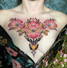 a woman with flowers painted on her chest