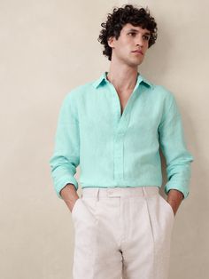 Cut from 100% linen, we love this shirt for its beautiful, natural texture and ability to stay cool and crisp, even in heat and humidity.  Slim fit.  Spread collar with button-front closure.  Shirttail hem.  Slim fit.  Long sleeves.  Hip length.  Model: Size M, 6'2" (188cm). Garden Wedding Mens Attire, Turquoise Shirt Outfit, Blue Shirt Outfit Men, Ceramic Witch, Turquoise Clothes, Men Linen Shirt, Turquoise Shirt, Shirt Outfit Men, Mens Attire