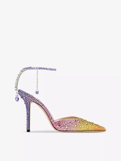 Who said sparkling jewels were only for your ears, neck and wrists? Jimmy Choo adorns the Saeda 100 courts with glittering gems by swapping a traditional ankle strap for a crystal-embellished chain that work its way down the back of the ankle. Keeping the rest of the style’s construction simple, the London-based shoemaker crafts the pointed-toe silhouette from soft satin and sits them on a sculptural curved heel. Dreamy. Jimmy Choo Saeda, Satin Heels, Dream Shoes, Way Down, Who Said, Ankle Bracelets, Jimmy Choo, Ankle Strap, Gems