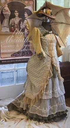 Silk lisere, silk taffeta, silk chifffon, and antique tambour lace a la mode 1878, with a hat stitched on my original 1877 Wilcox & Gibbs chainstitch treadle machine. A Lily Absinthe original, it was refashioned for my client and now has a new home. Tambour Lace, Silk Taffeta, Chain Stitch, And Now, New Home, Period