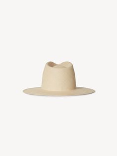 Details Greta is meticulously crafted from natural-toned Panama straw into a structured silhouette with a flat brim, conjoining sophistication and craftsmanship to create the ultimate straw staple. · Brim: 3.5"· Crown: 4.75"· Structured Panama Straw Fit Runs true to size. If between sizes, we suggest sizing up. Natural Straw Hat With Structured Crown For Vacation, Spring Natural Hat With Structured Crown, Elegant Unlined Panama Hat With Curved Brim, Elegant Curved Brim Unlined Panama Hat, Vacation Straw Hat With Structured Crown In Natural Color, Spring Straw Panama Hat With Structured Crown, Beige Straw Hat With Structured Crown For Summer, Beige Structured Crown Straw Hat For Summer, Summer Straw Hat With Structured Crown In Beige