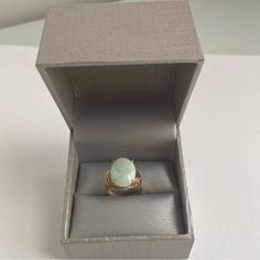 Vintage Jade Ring In Real 10k Yellow Gold. No Cracks In Jade, Gold In Great Vintage Condition. There Are Some Designs On The Sides And Top. Designer Is Unknown. Jade Stone Measures 7/8” From Top To Bottom And 1/2” Side To Side. Ring Size 7. Elegant Green Opal Ring In 14k Gold, Elegant Yellow Gold Jade Rings, Elegant Green Opal Oval Ring, Elegant Gold Jade Ring, Elegant Green Hallmarked Opal Ring, Elegant Jade Ring For Anniversary, Elegant Opal Ring For Formal Occasions, Elegant Green Opal Ring, Elegant Formal Opal Ring