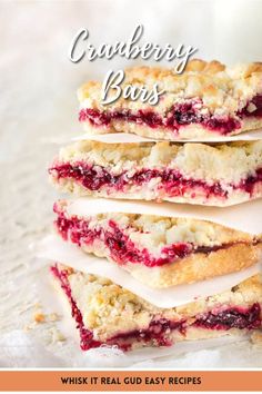 four cranberry bars stacked on top of each other with text overlay that reads,