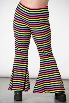 PRISMATIC.- Ribbed, thick, super stretch cotton fabric.- Statement stripe design.- Flared bottoms.- Elasticated waistband.- Fitted.Model is 5ft 7 and wears an 3XL.with KILLSTAR branding, 92% Cotton 8% Elastane. Plus Size Pastel Goth, Flared Bottoms, Pastel Goth Outfits, Top Clothing Brands, 2010 Fashion, Stretch Cotton Fabric, Pastel Stripes, Top Beauty Products, Goth Outfits