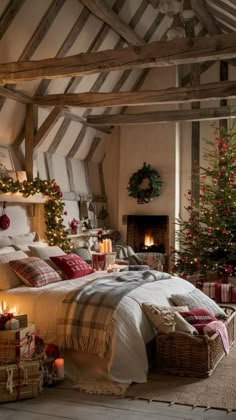 a bedroom decorated for christmas with candles and presents