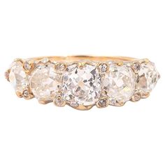 Late Victorian Era 5-Stone Half Hoop Ring composed of 18k yellow gold. With a total Old Mine Cut Diamond weight of 3.39 Carats. Featuring a center 1.00 carat Old Mine Cut diamond, GIA certified J color & SI2 clarity. Flanked by 4 Old Mine Cut Diamonds weighing approximately 2.39 carats in total, with a color range approximately of J-K-L, clarity range of VS2-SI2. With 10 smaller accent Old Mine Cut/Rose Cut diamonds set into the prongs. Engraved shoulders & openwork gallery. Circa 1890-1900. Fit Personal Jewelry, Old Mine Cut Diamond, Victorian Rings, Rose Cut Diamond, Antique Rings, Cluster Ring, Victorian Era, Hoop Ring, Eternity Bands