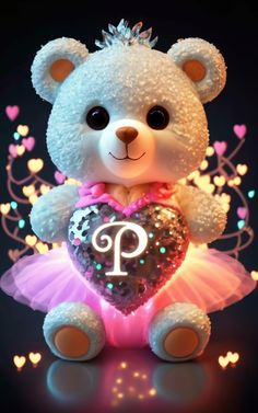 a white teddy bear holding a heart with the letter p on it's chest