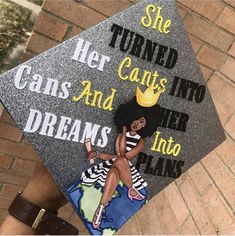 a woman wearing a graduation cap that says she turned her caps into dreams