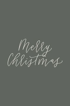 the words merry christmas written in white on a gray background