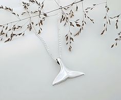 This awesome necklace features a 925 solid sterling silver whale fluke tail. I strongly recommend a curb chain for this pendant..  Use this link to Add On Engraving Service: https://etsy.me/30lndjH Cast using 100% sterling silver, no pewter, nickel or lead was used to create this piece, buy with peace of mind. ツ ☮  More Whale tail designs.: http://etsy.me/2lwPnrj . Celtic/Trinity/Knots Jewelry.: http://etsy.me/1nlTdzo . Big collection men's Necklaces: http://etsy.me/1DwrNLc . More Symbolic Jewelry? http://etsy.me/16So5MK . . Need initials, birthstones, charms, etc: http://etsy.me/10D9H8j This listing is for the main picture: ~ 925 Sterling silver Pendant:  20 high x 30 mm wide ~ 92.5 Sterling Silver Italian chains. I recommend a curb chain for these pendants. Please select the chain from t Whale Fluke, Whale Tail Jewelry, Jewelry Engraving, Whale Tail Necklace, Whale Necklace, Symbolic Jewelry, Whale Tail, Meaningful Jewelry, 925 Sterling Silver Chain