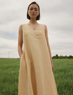 Introducing our stunning long maxi dress with puffed sleeves. It's double sided with pearl button, oversized fit in perfect forest green shade 100% stonewashed linen  OEKO-tex standard 100 certified  We have linen dresses in two sizes - S-M and M-L, but we are happy to make additional sizes for you. XS-S Bust - 31.5 - 34.6 inches (80-88 cm) Waist - 25.4 - 28.3 inches (64.5-72 cm) Hips - 34.6 - 38.2  inches (88-97 cm) M-L Bust - 34.6 - 38.2  inches (88-97 cm) Waist - 28.3 - 31.8 inches (72-81 cm) Hips - 38.1 - 41.3 inches (97-105 cm) DETAILS 100% linen dress Decorative cotton ribbons  Model Measurements - bust (87 cm - 34.2"), waist (65 cm - 25.5"), hips (91 cm - 35.8"). Model wears XS-S SHIPPING AND DELIVERY All orders are sewed in our workshop. They are packed and shipped within the shop' Relaxed Fit Sleeveless Unlined Maxi Dress, Beige Linen V-neck Maxi Dress, Beige Linen A-line Maxi Dress, Beige A-line Linen Maxi Dress, Spring Beige Linen Dress With Pockets, Relaxed Fit A-line Linen Maxi Dress, Linen Sundress With Relaxed Fit, Relaxed Fit Linen Sundress, Linen Sundress In Maxi Length