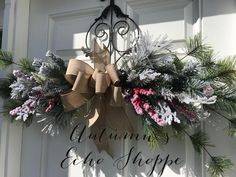 a door with a wreath hanging from it's side