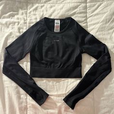 - In Brand New Condition, Worn 1-2 Times - Size Small, Slight Stretch To Fabric Black Long Sleeve Top For Light Sports, Black Breathable Tops For Winter, Long Sleeve Black Top For Casual Sports, Black Breathable Winter Tops, Fitted Activewear For Streetwear, Black Snug Fit Sporty Top, Sporty Snug Fit Black Top, Black Go-dry Tops For Winter, Black Basic Activewear With Medium Support