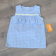 New Gymboree Buffalo Check Of Baby Blue And White Ruffle Daisy's Button Back Size 4t Spring Playwear Tops With Buttons, Light Blue Tops For School In Spring, Spring Playtime Tops With Buttons, Blue Tops With Buttons For Playtime, Light Blue Tops For Playtime In Spring, Light Blue Tops For Spring Playtime, Plaid Top, Buffalo Check, Plaid Tops