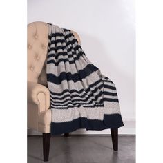 a chair with a blanket on top of it