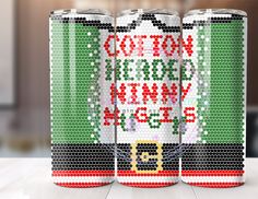 three cans of coca - cola are made out of legos and have words written on them