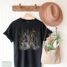 "Vintage Botanical Shirt, Wildflower Tee, Botanical Shirt, Gardening Floral t shirts, Boho Shirt Floral T shirt, Bohemian Shirts, Plant Shirt, Fern Botanical Cottagecore Shirt, Comfort Color, Wildflowers Shirt, Gardener Shirt, Nature Lover Gift for Her, Vera Fern, Forest Plant Shirt, Forest Graphic Tee, Nature Lover Gift, Ferns, Mushroom Shirt, Forester Shirt, Botanical Tshirt, Gardening Shirt, Plant Shirt, Wildflowers Shirt, Comfort Colors® Poppies T Shirt, Watercolor Poppy Flowers Shirt, Wildf Botanical Cotton Shirt With Plant Print, Cottagecore Floral Embroidery T-shirt For Summer, Black Botanical Top For Spring, Bohemian Spring T-shirt With Floral Embroidery, Cottagecore Embroidered Cotton Top, Bohemian Spring Shirt With Plants Print, Cotton Cottagecore Top With Embroidery, Bohemian Shirt With Plants Print For Spring, Botanical Style T-shirt With Floral Embroidery