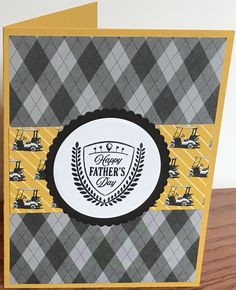 a father's day card with a tractor on the front, and a happy father's day badge on the back