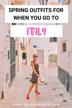 a woman standing in an alleyway with the words spring outfits for when you go to italy