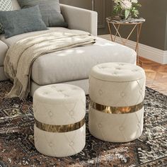 a living room scene with focus on the foot stools and ottomans in the foreground