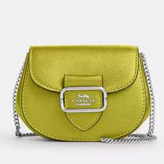 Mini Bag Coach Morgan Card Case On A Chain , Nwt Foil Metallic, Smooth Leather, Inside Multifunction Pocket, Snap Closure, Fabric Lining, Detachable Chain Strap With 23 1/4 “ Drop For Shoulder Or Crossbody Wear. 5”(L) X 3 3/4” (H) X 2 1/4” (W). Color Neon Green With Silver Hardware. Classic Silver Shoulder Bag With Chain Strap, Classic Silver Bag With Chain Strap, Silver Rectangular Wallet On Chain With Strap, Coach Crossbody Bag With Chain, Silver Wallet On Chain For Everyday Use, Coach Gold Wallet On Chain With Chain Strap, Silver Leather Wallet On Chain With Chain Strap, Coach Evening Bag With Chain, Coach Evening Bags With Chain Detail