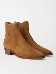 Western-inspired boots are among Mr Hedi Slimane's calling cards, part of a vintage rock 'n' roll sensibility he's transmitted to his creative direction at CELINE HOMME. This Chelsea pair is made from brown suede with elasticated gussets and a Cuban heel. Wear it with: CELINE HOMME Sweater, CELINE HOMME Jeans, CELINE HOMME Belt, CELINE HOMME Pouch. Brown Suede Chelsea Boots, Chelsea Boots For Men, Suede Chelsea Boots, Cuban Heels, Chelsea Boots Men, Boots For Men, Vintage Rock, Calling Cards, Creative Direction