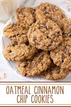 A plate stacked with Oatmeal Cinnamon Chip Cookies. Cookies Using Cinnamon Chips, Oatmeal Raisin Cinnamon Chip Cookies, Oatmeal Cookies With Cinnamon Chips, Cinnamon Oatmeal Chocolate Chip Cookies, Cinnamon Chip Oatmeal Cookies, Cinnamon Chip Desserts, Cinnamon Chip Cookies Recipes, Oatmeal Cinnamon Chip Cookies, Cinnamon Chips Recipes Baking