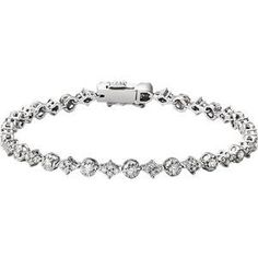 a white gold bracelet with round diamonds on the clasp and an oval link, set in 18k white gold