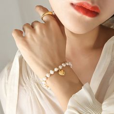 Style: Female Material: Titanium Steel, Freshwater Pearl Pearl Type: Cultured Pearl Color: White Pearl Shape: Irregular Bracelet Color: Gold Bracelet Length: 14cm Fresh Water Pearl Bracelet, Bracelets Beaded, Freshwater Pearl Bracelet, Flower Hair Accessories, Pearl Types, Elastic Bracelet, Pearl Color, Fashion Accessories Jewelry, Cultured Pearls