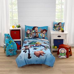 a bed with toy story characters on it