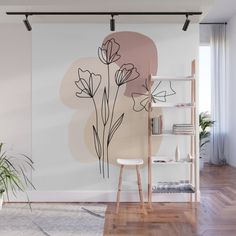 a wall mural with flowers and plants on it in a living room area, including a ladder