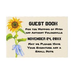 a sign with a sunflower on it that says guest book for the wedding of mya and anthony fogerville