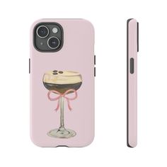 a pink phone case with an image of a wine glass and bow on the back